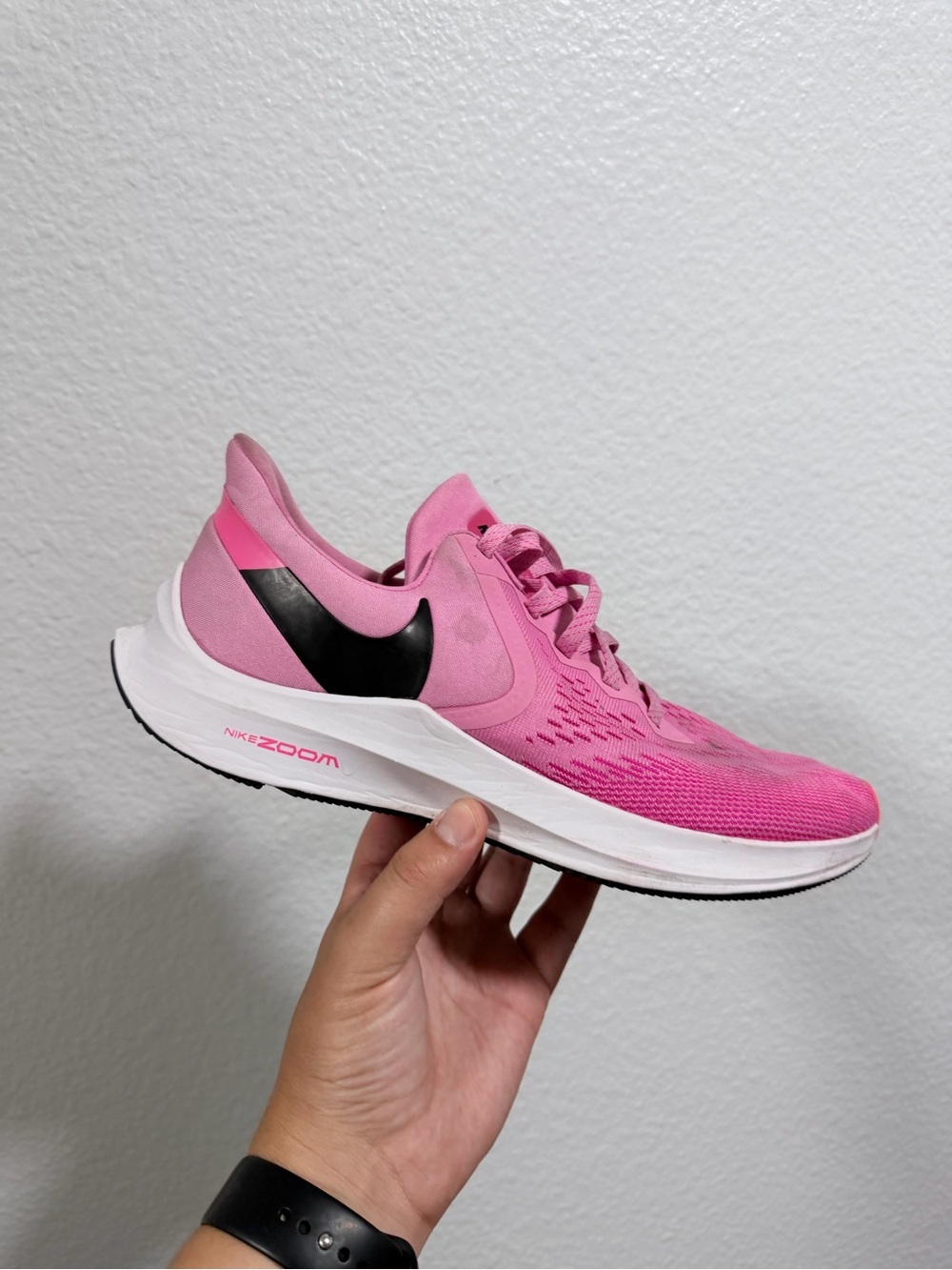 Nike Women's Pink Running Shoe with Black Swoosh